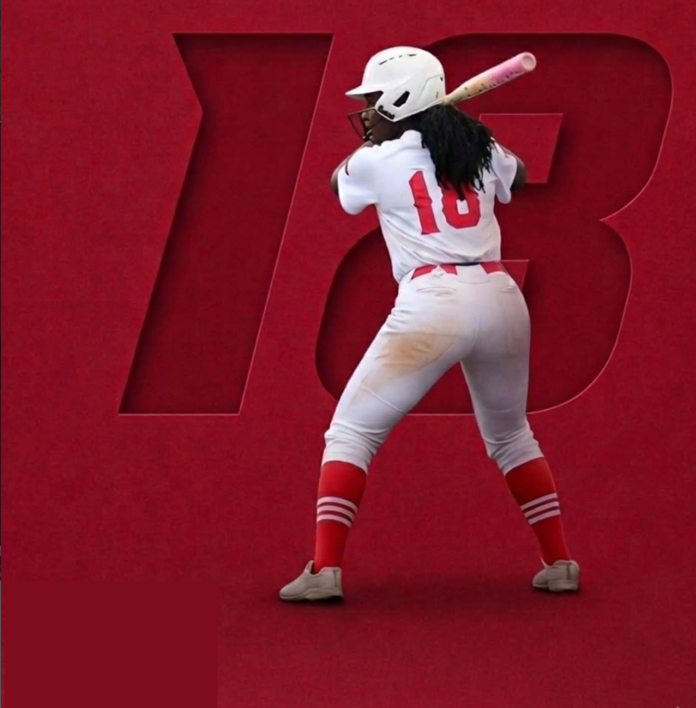 Avery Satchell, #8, batting stance in white and crimson uniform